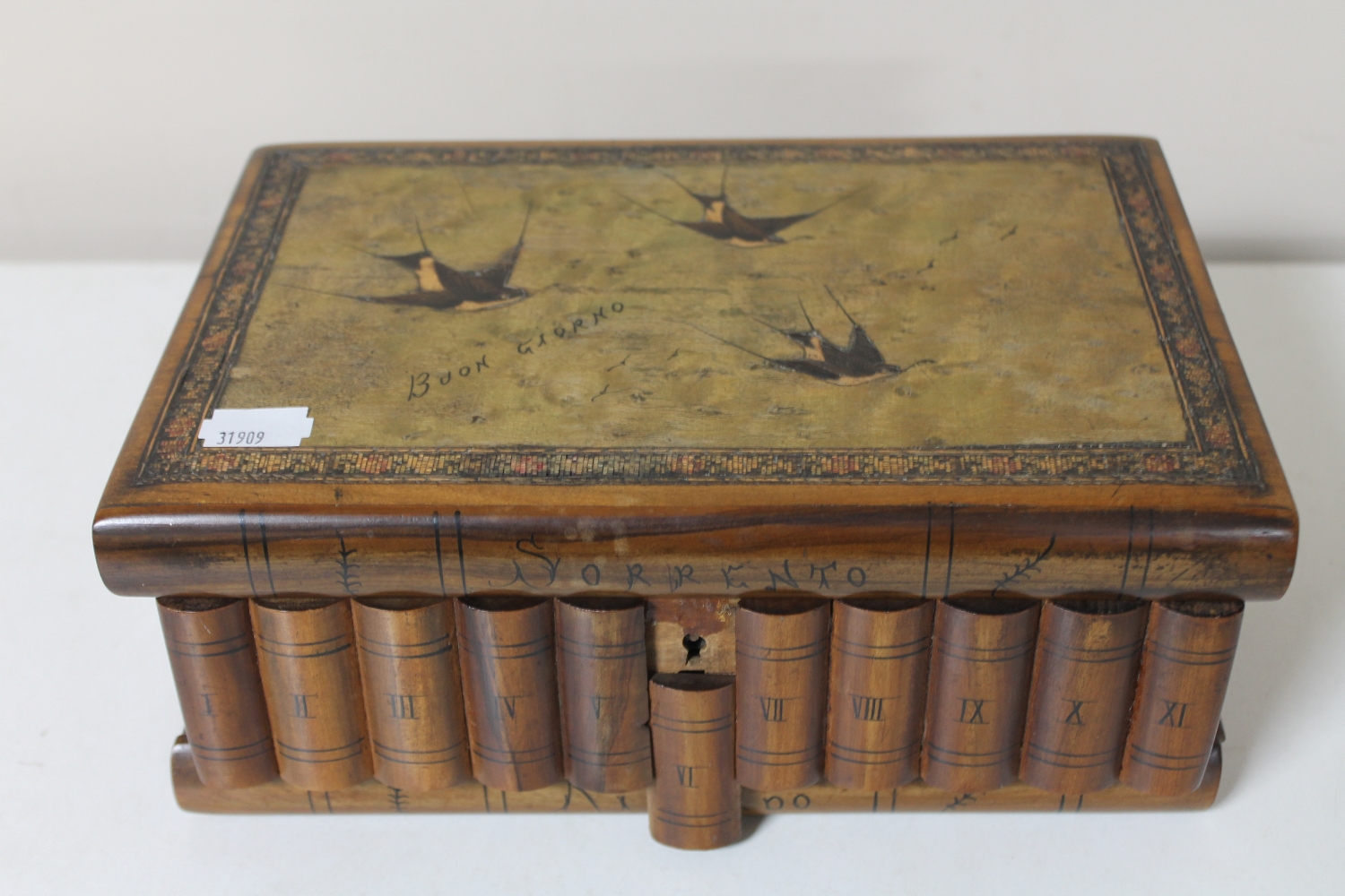 An antique Italian jewellery puzzle box in the form of a book