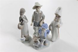 A Lladro figure of a fisherman,