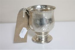 A silver mug,