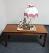 An inlaid mahogany coffee table and tray of table lamp with shade,