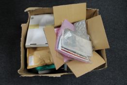 A box containing a large quantity of crafting items