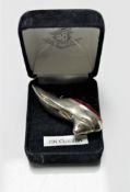 A small silver pin cushion in the form of a lady's shoe