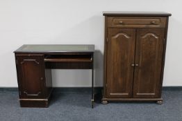 A continental style oak effect double door cabinet fitted a drawer together with a mahogany single