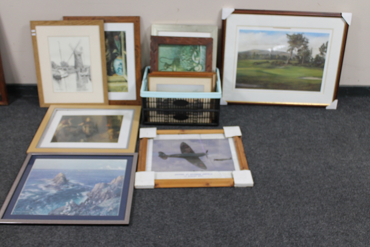 A box of framed pictures and prints including a framed signed limited edition golfing print,