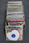 A plastic crate containing LP's, rock and pop including The Beatles, Led Zeppelin,