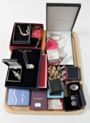 A tray of boxed fashion and costume jewellery,