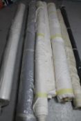 Eight rolls of fabric