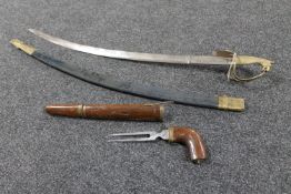 An Indian sword in scabbard together with a set of Indian servers in a carved hardwood sheath