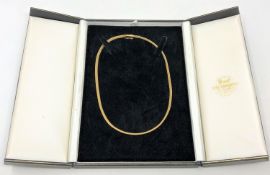 An 18ct gold herringbone textured necklace, length 40cm CONDITION REPORT: 15.2g.