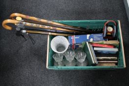 A box of five assorted walking sticks, two bearing badges, glass ware, boxed Academy walkman,