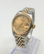 A lady's Rolex 18ct gold and stainless steel Oyster Perpetual Datejust wristwatch,