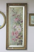 An antiquarian gilt framed oil on canvas depicting flowers,