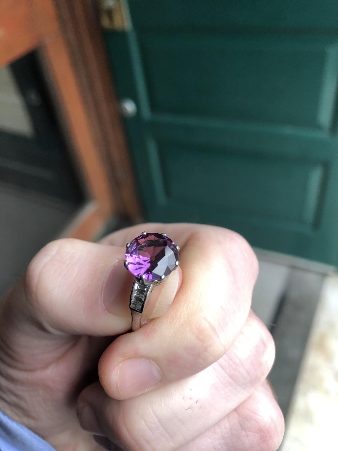 An 18ct gold ring, possibly Alexandrite, with baguette-cut diamond set shoulders, - Image 4 of 5