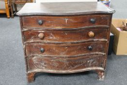 A George III inlaid mahogany serpentine front four drawer chest (a/f)