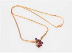 A fine quality 18ct gold ruby and diamond necklace, 12.4g.