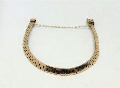 A 9ct gold brick link bracelet CONDITION REPORT: 14.