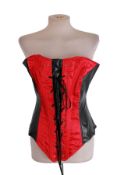 Approximately 50 mixed eyelet corsets