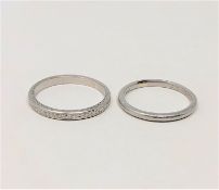 Two platinum band rings, sizes L and N CONDITION REPORT: 6.