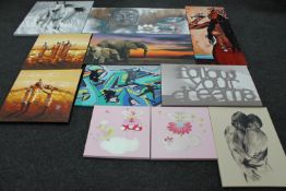 Eleven assorted wall canvases