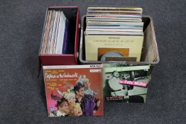 A record case and crate containing assorted records including jazz and classical,