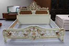A cream and gilt Roccoco style 6' bed frame CONDITION REPORT: General wear to