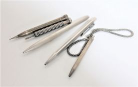 A box of silver pen together with four silver mechanical pencils