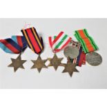 A group of WWII medals comprising War Medal, Victory Medal, 1939-45 Star, Italy,