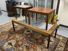 A mid twentieth century Danish tiled coffee table together with two further side tables