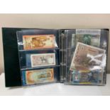 An album of World bank notes including a sealed wrap of 5,000 Iraq Dinar etc.