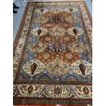 An Iranian rug, 316 cm x 194 cm CONDITION REPORT: Appears to be in good condition.