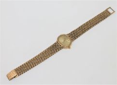 A lady's 9ct gold Bueche-Girod quartz wristwatch, on 9ct gold integral bracelet.