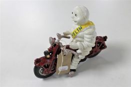 A cast iron Michelin Man figure