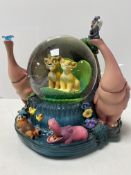 A Disney Lion King musical snow globe in original box