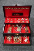 A large box of costume jewellery, silver gate bracelet, dress rings, chains,