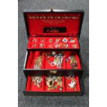 A large box of costume jewellery, silver gate bracelet, dress rings, chains,