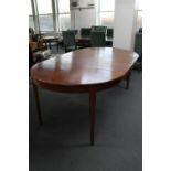 A 20th century dining table with two leaves