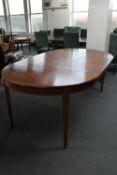 A 20th century dining table with two leaves