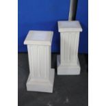 Two painted composition columns