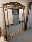 An ornate gilt framed Regency style mirror,