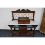 A Victorian mahogany marble topped and tiled back wash stand