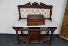 A Victorian mahogany marble topped and tiled back wash stand