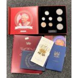 A commemorative coin and stamp set celebrating her majesty's 90 glorious years,