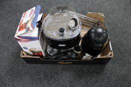 A box of Delonghi coffee maker, coffee maker, popcorn maker,