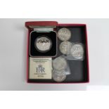 A box of five Victorian silver crowns,