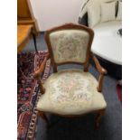 A stained beech framed continental salon chair upholstered in a tapestry fabric