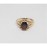 A 9ct gold garnet set ring, size V CONDITION REPORT: 2.