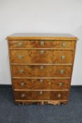An antique continental birch and pine five drawer chest