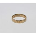 An 18ct gold band ring, size Q1/2 CONDITION REPORT: 3.7g. In good condition.