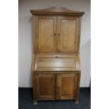 A 19th century continental oak bureau bookcase