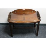 A mahogany butler's table